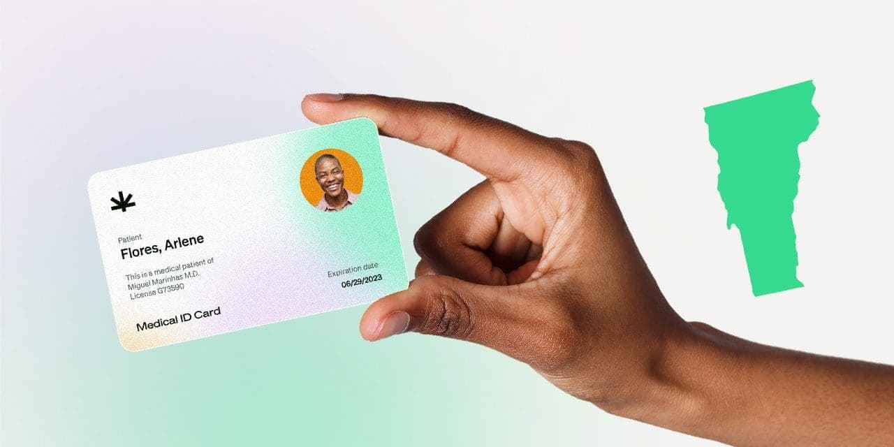 closeup hand holding MMJ card